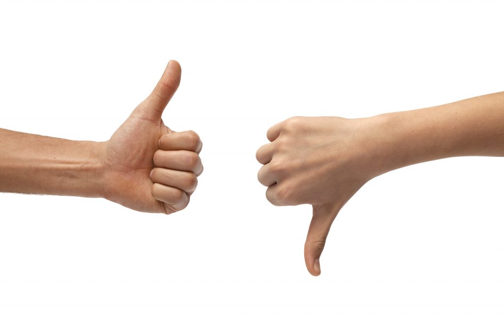 Thumb up and down hand signs