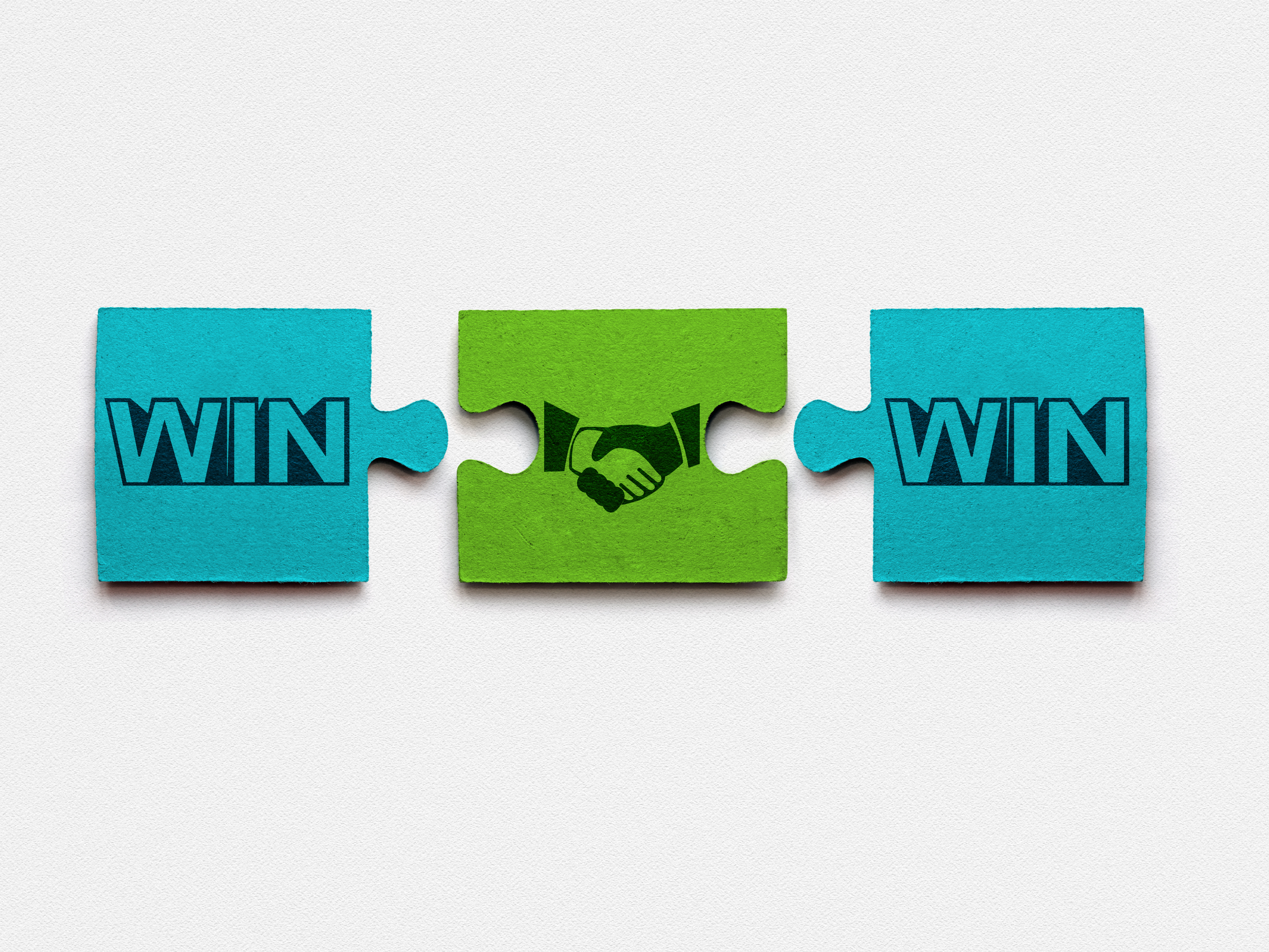 Puzzle pieces with text win win