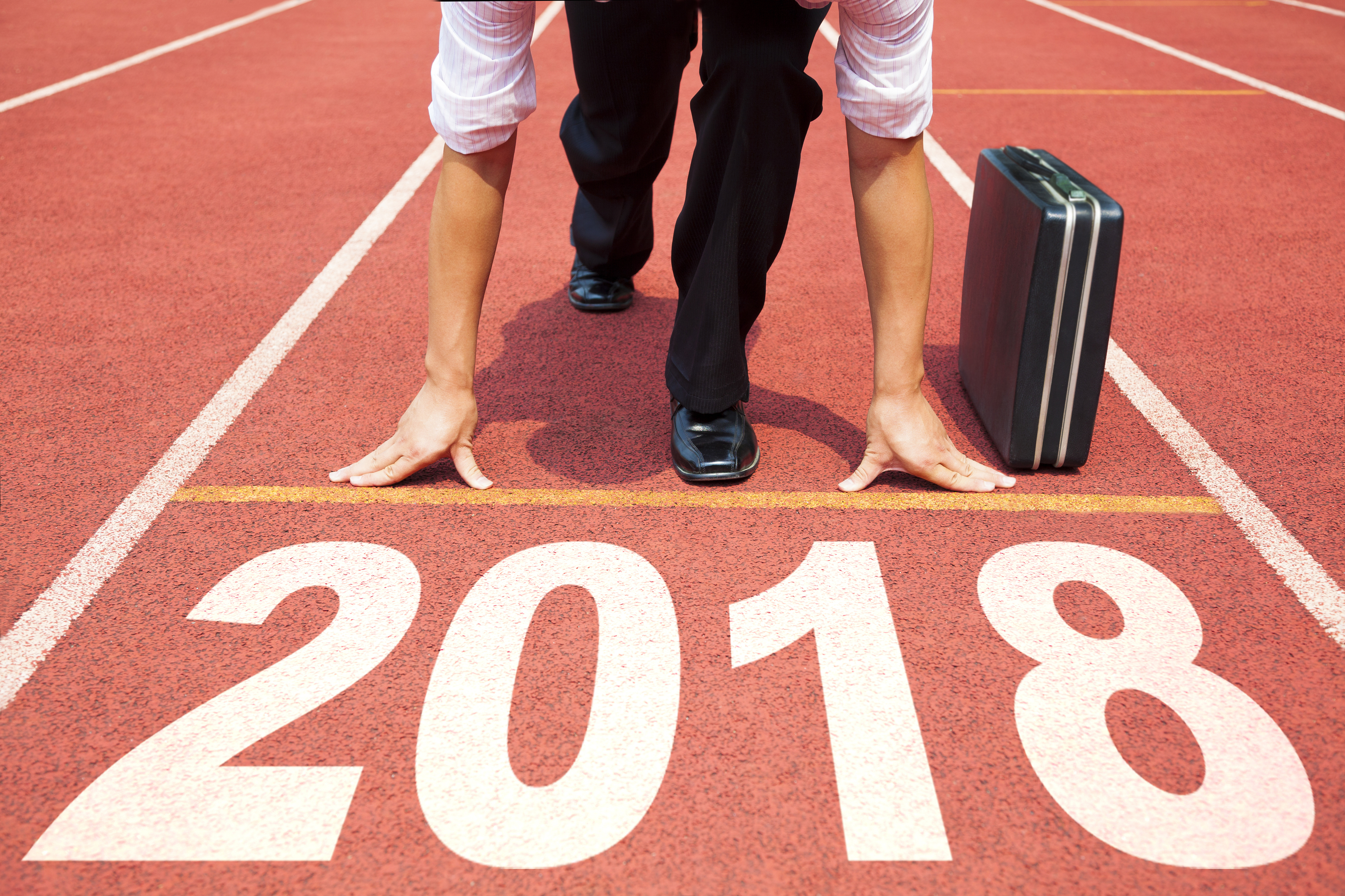 businessman ready to run and 2018 new year concept