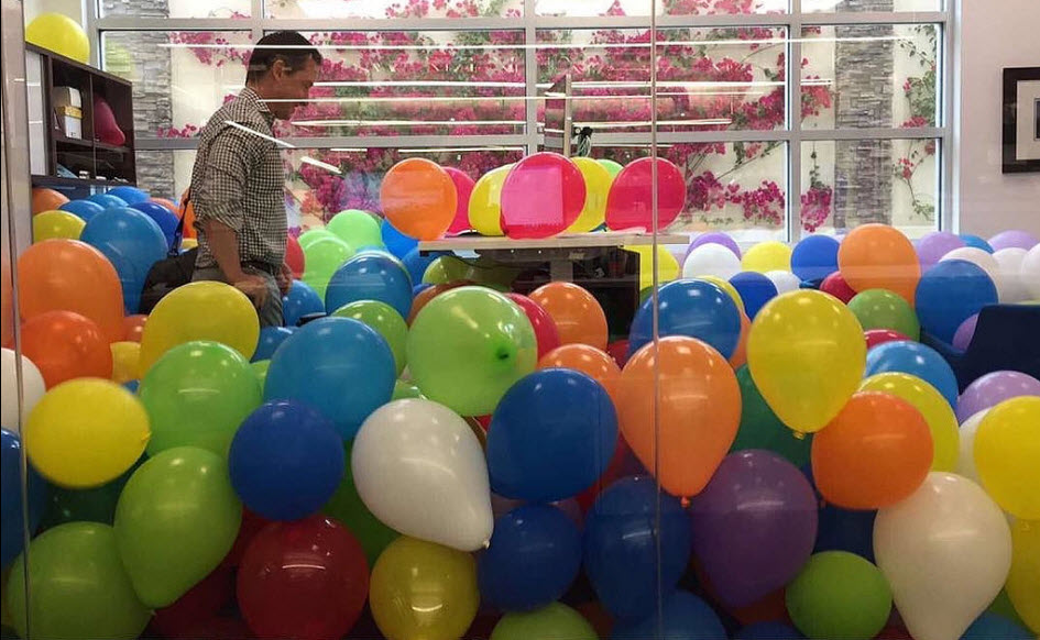 Man Discovers Balloons in His Office