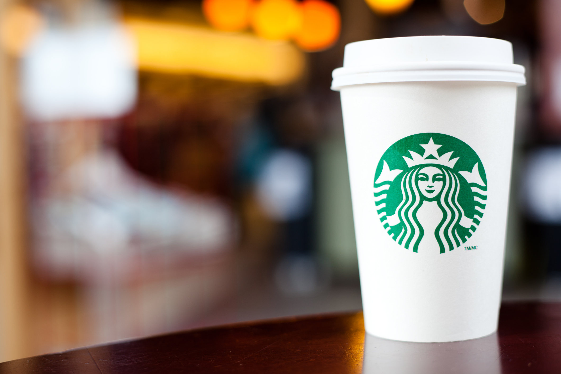 Starbucks cup on the counter