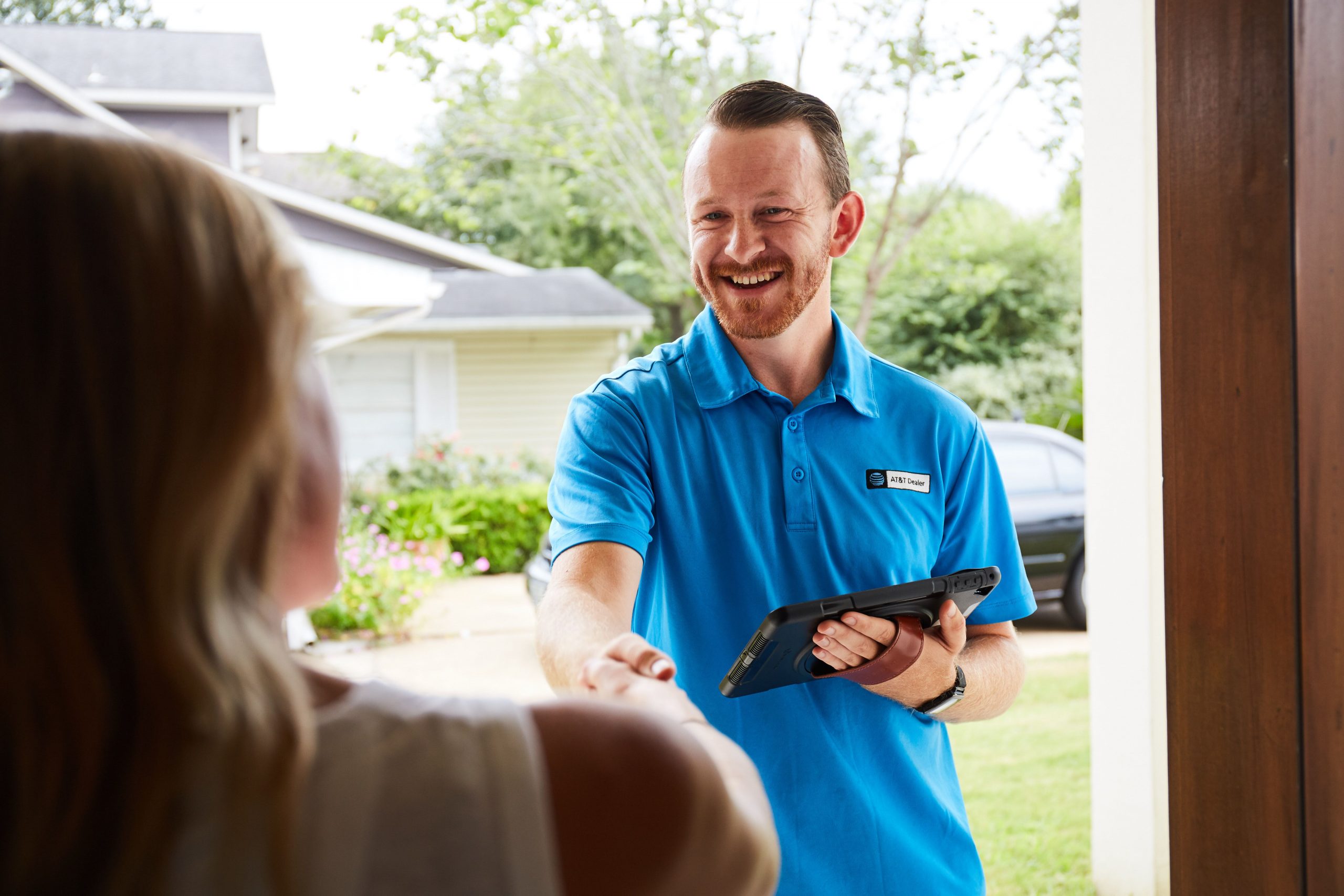  Door-to-Door marketing BTL activity example of a salesperson standing at the door