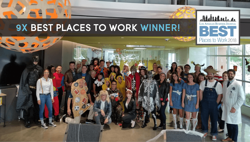 Image of Cydcor team members gathered in the heart for a halloween celebration.