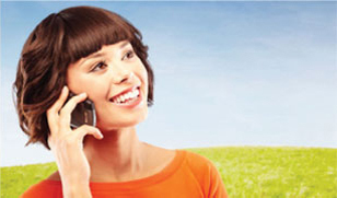 Woman smiling and talking on a mobile phone