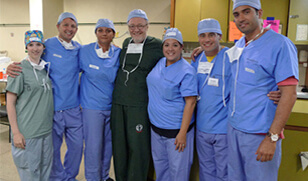 Photo of volunteers dressed in scrubs at an Operation Smile medical mission.