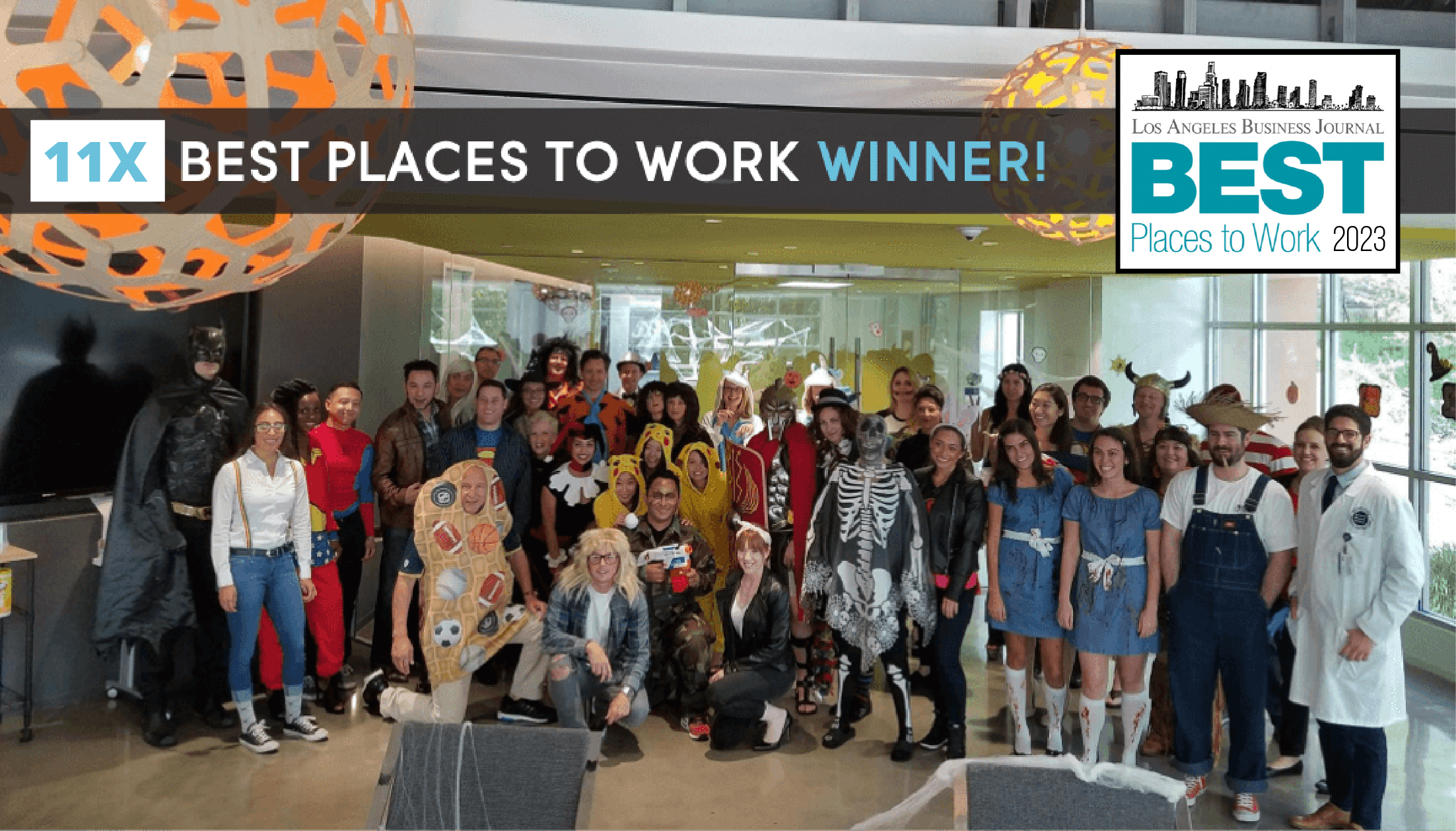 Image of Cydcor team members gathered in the heart for a halloween celebration.